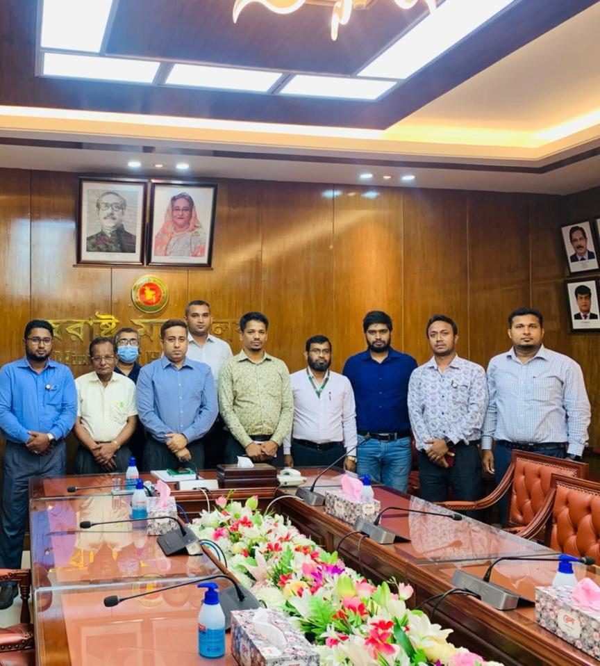 Officials with Md Rubel Hossain at Ministry of Home Affairs