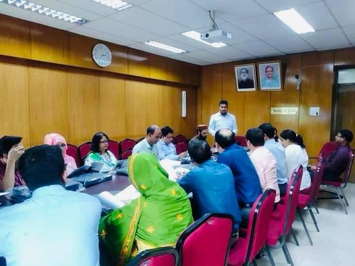 Md Rubel Hossain leading a briefing session at Bangladesh Secretariat