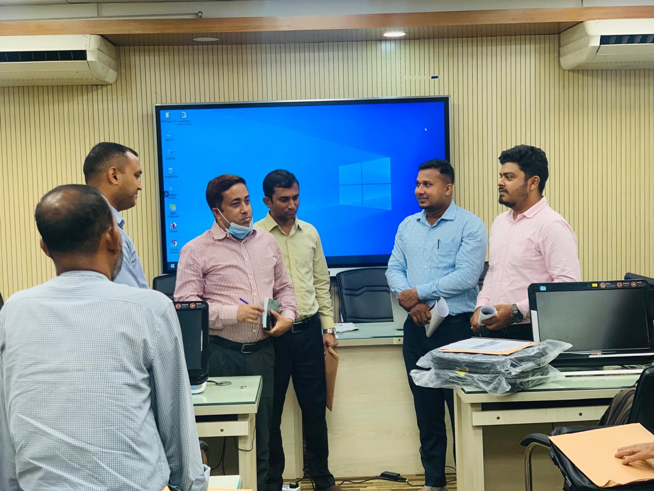 Team discussion ahead of an overseas training program