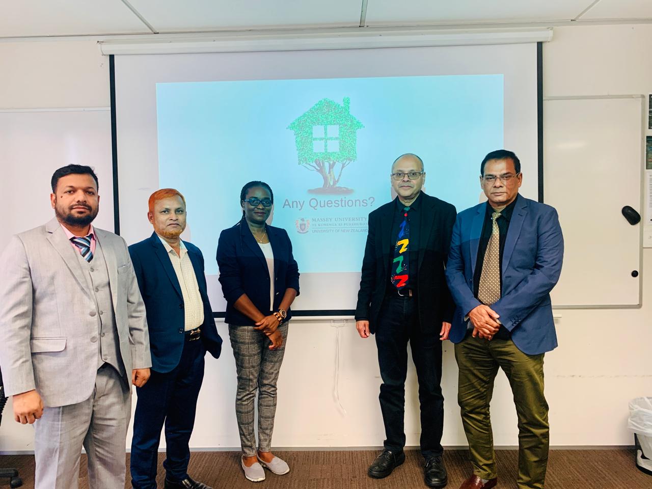 Delegation members with faculty after seminar