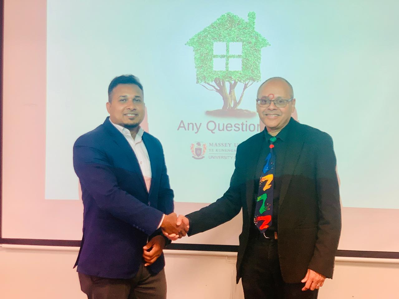Handshake with faculty at Massey University, New Zealand